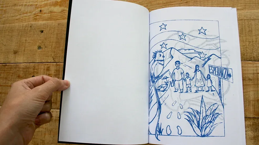 Fanzine abierto con una familia caminando hacia la esperanza en una ilustración azul